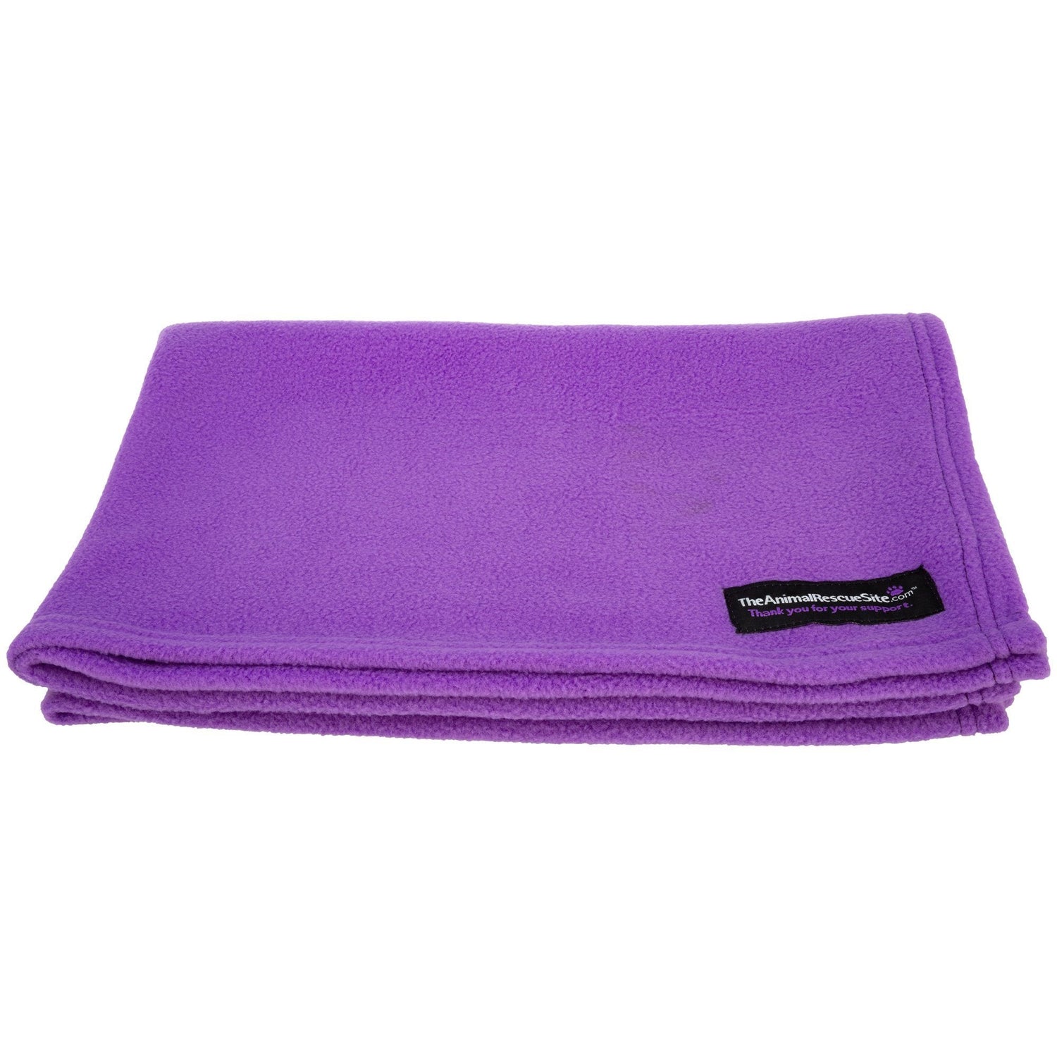 Purple pet blanket folded, showing a small black logo label on the corner
