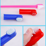 Pet finger toothbrush set with pink, red, and blue soft bristle caps