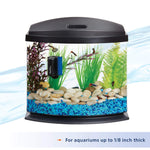 Magnetic aquarium cleaning tool attached to tank glass with scrubber on side