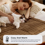 Brown faux rabbit fur pet mat with ribbed quilt surface, with a small dog resting on it.