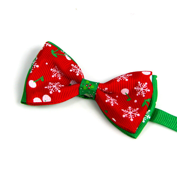 Red Christmas bow tie for pets with green band and snowflake and candy prints