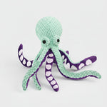Six-claw fish plush dog toy, mint-green body with purple tentacles