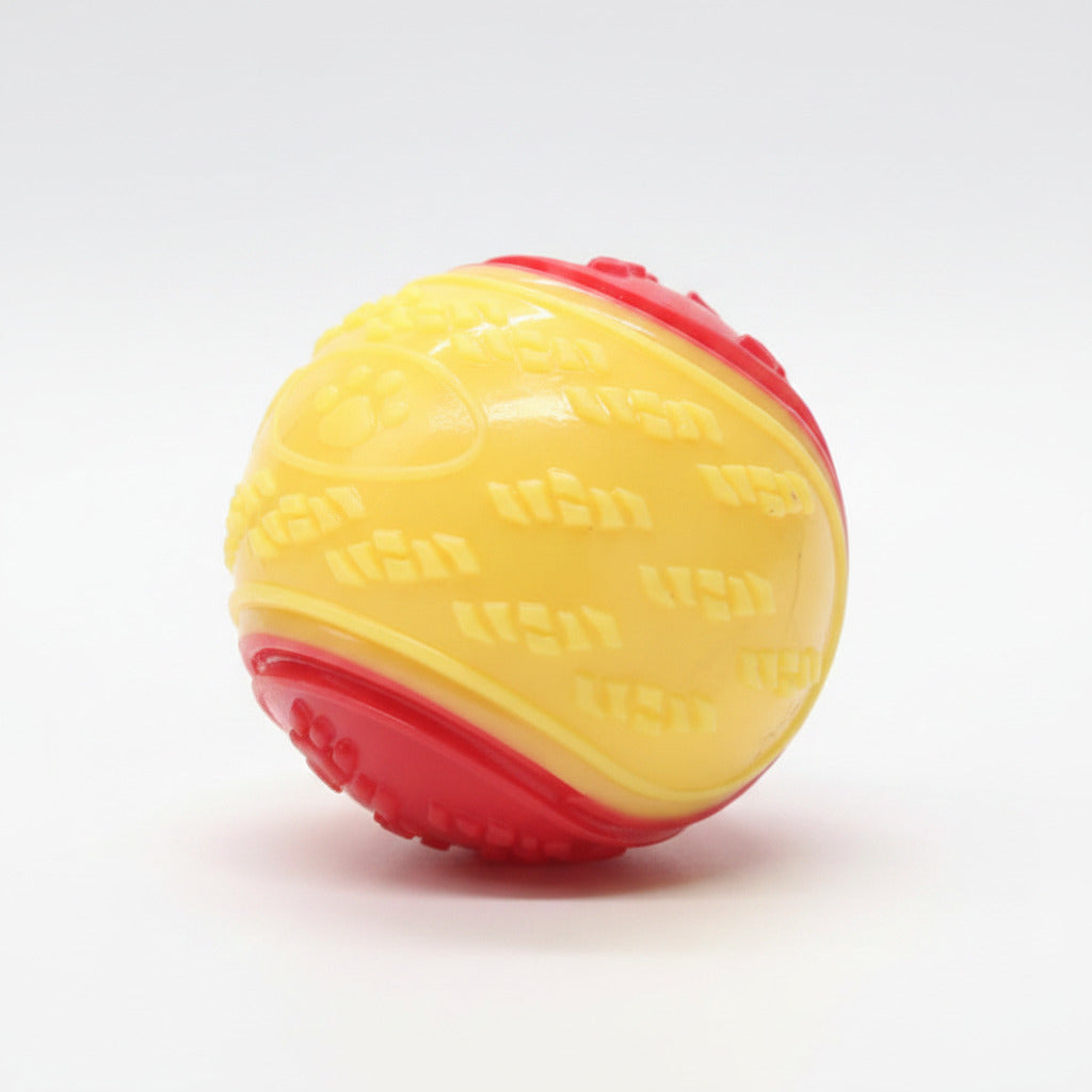 Dog training ball toy with yellow and red textured shell