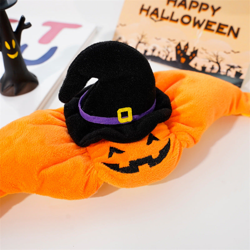 Orange pumpkin pet costume sleeve with jack-o-lantern print and black witch hat