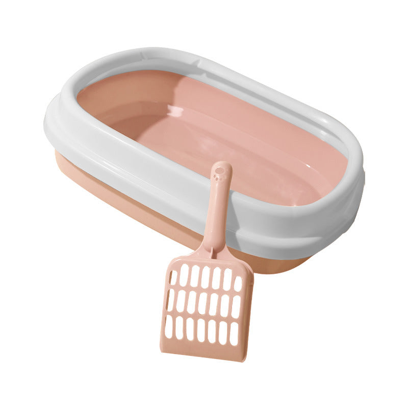 Anti-splash litter box tray in peach with white frame and matching scoop