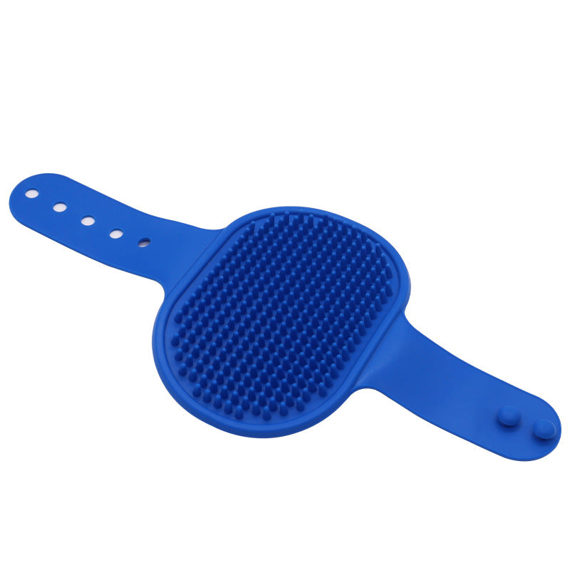 Blue silicone pet grooming brush with raised rubber massage bristles