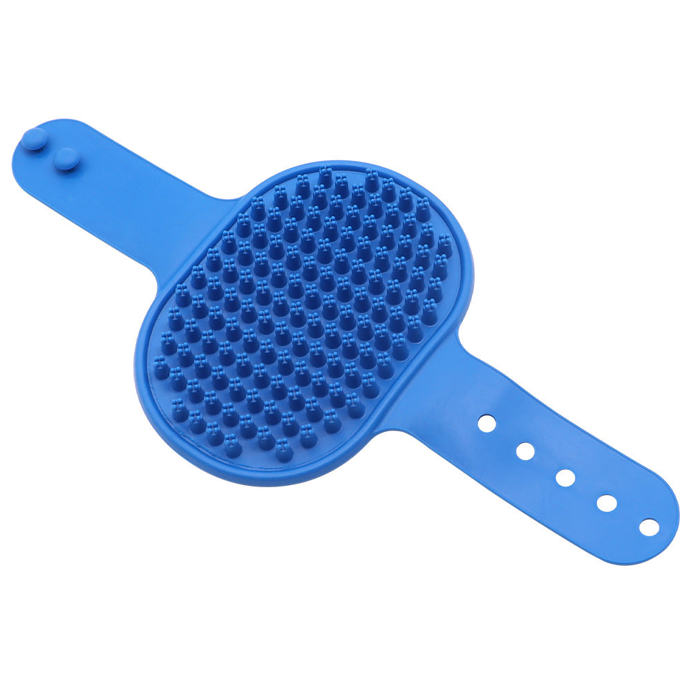 Blue silicone pet grooming brush with massage nubs and wrist holes