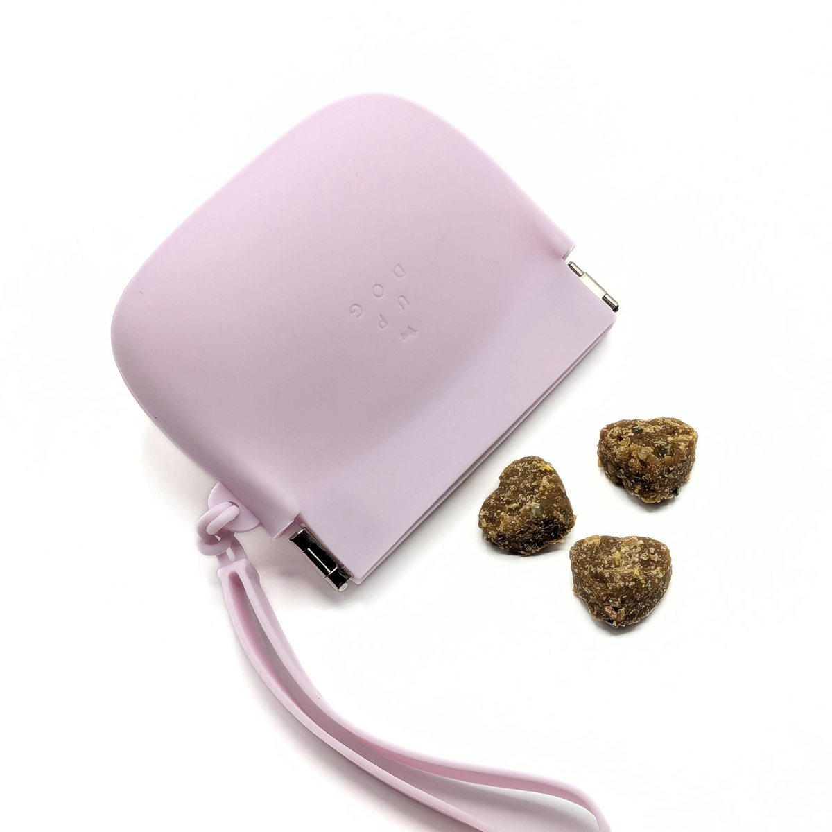 Mauve silicone treat training pouch with wrist strap and metal clip; treats included.