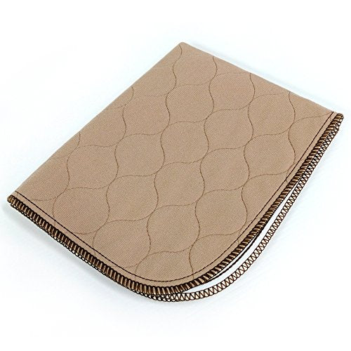 Tan pet mat fold detail with quilted hex pattern and stitched edge