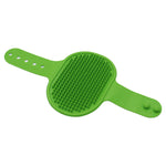 Green silicone pet grooming brush with raised rubber massage bristles