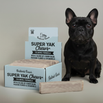 Badlands Ranch Super Yak chews calming formula with pale chew pieces and black dog
