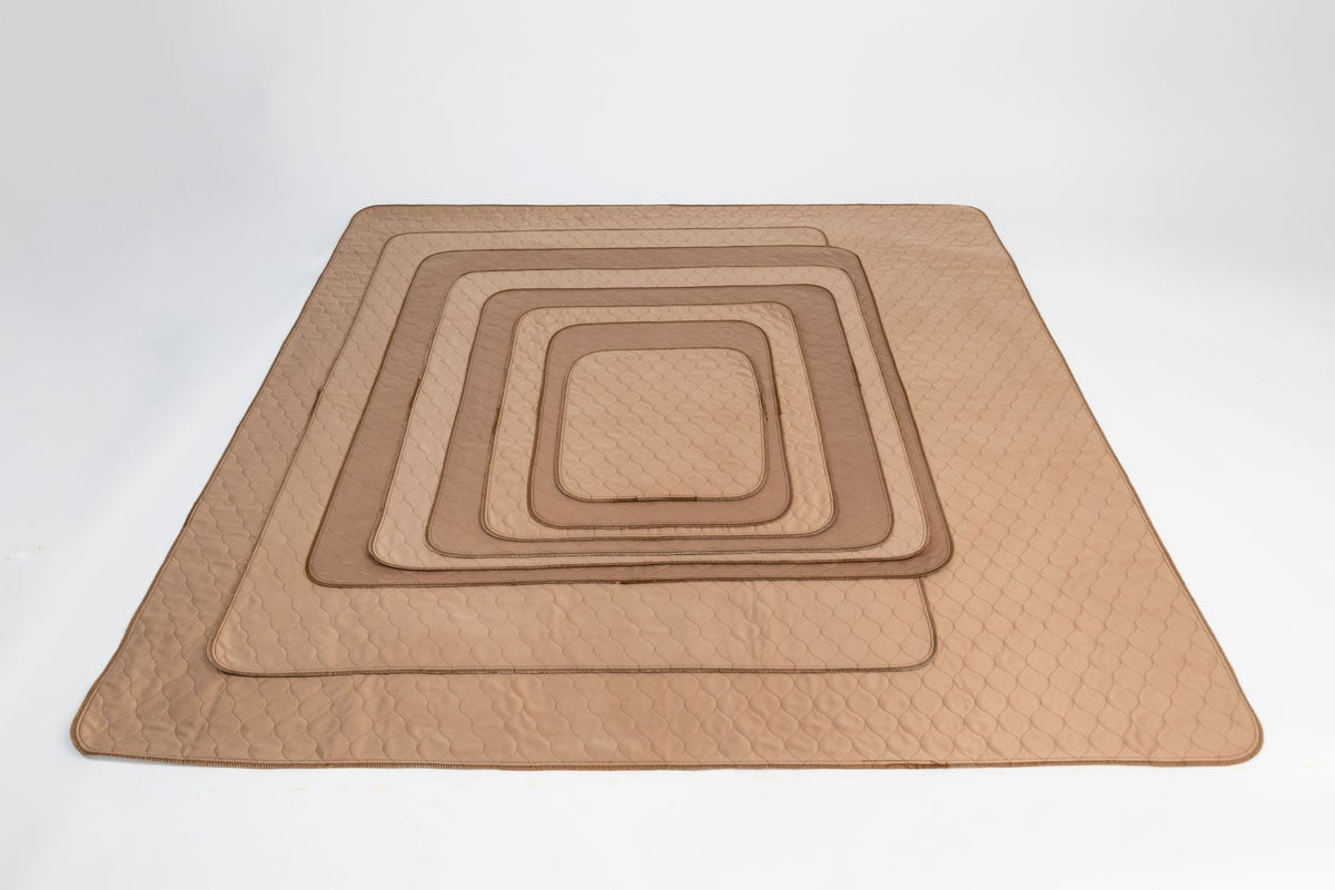 Tan pet wash mat, nested square pads, quilted hex pattern