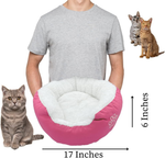Donut pet bed with cream plush nest and pink outer, 17-inch size