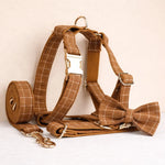 Brown plaid dog harness with leash, collar strap, and bow tie accessories