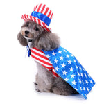 Patriotic dog costume with red-white striped hat and blue star dress