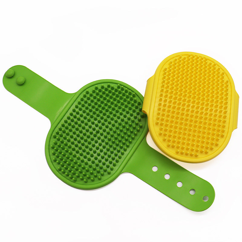 Green and yellow silicone pet grooming brush with raised massage dots