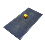 Dark plastic foundation sheet with small yellow wax block centered