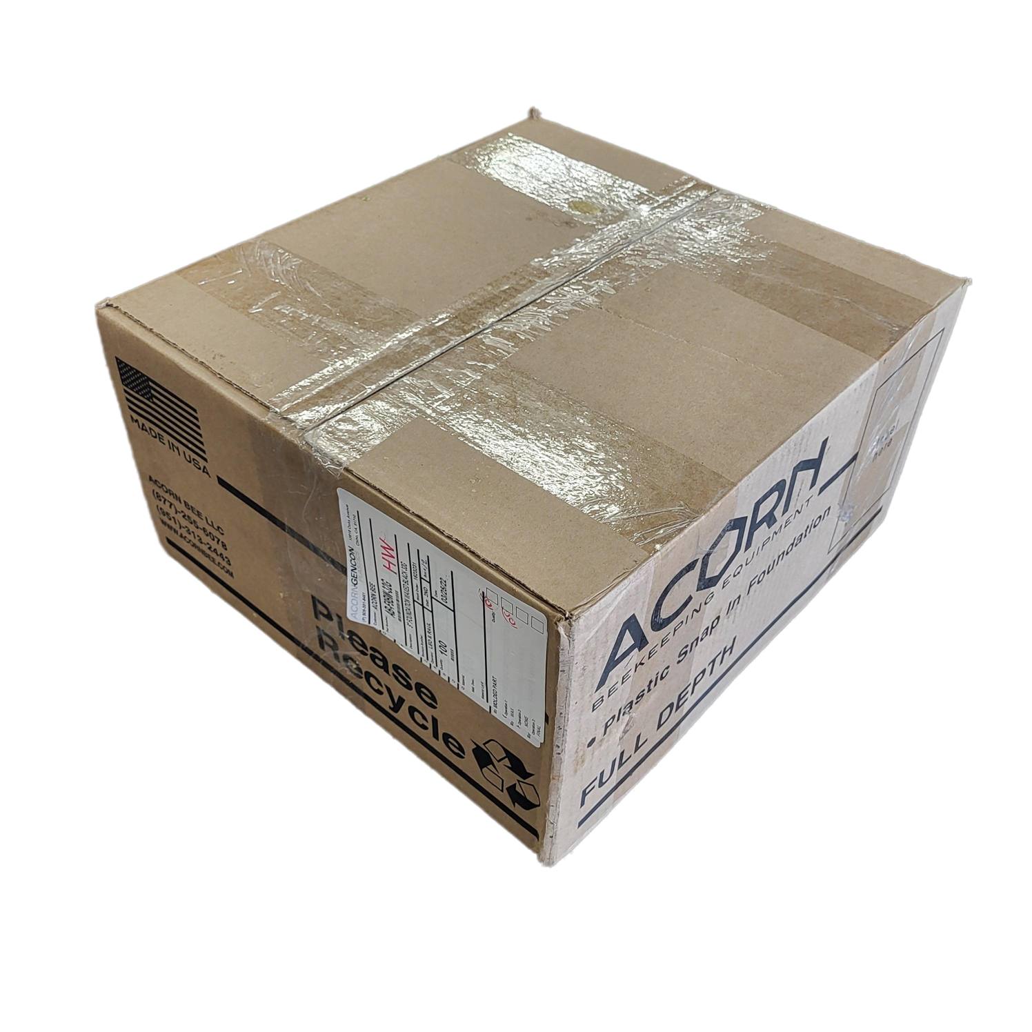Beige shipping box with printed labels and wrapped contents