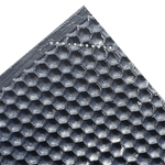 Close-up of dark plastic foundation with raised hexagon cells