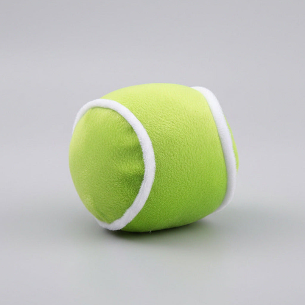 Plush squeaky lime-green dog ball toy with white trim and seams