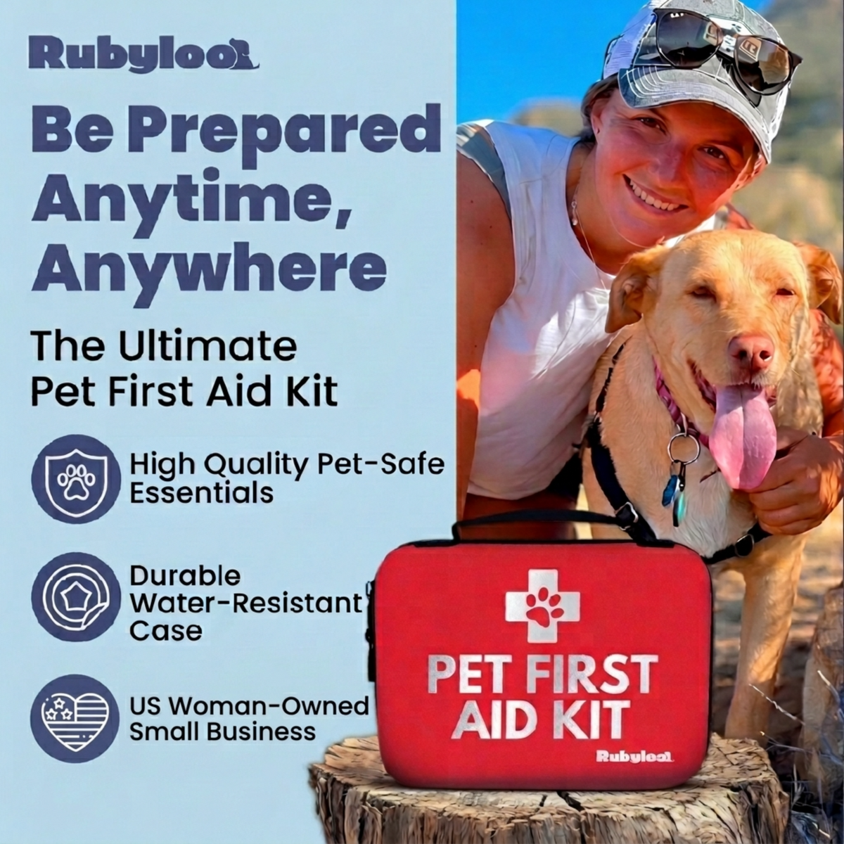 Pet first aid kit in red case with paw logo, held by a person outdoors