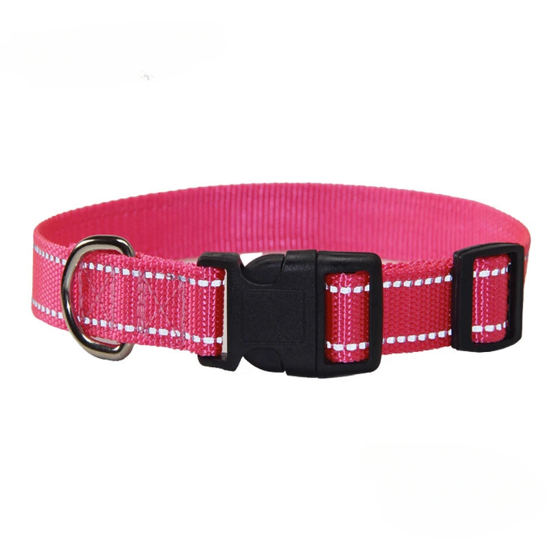 Red dog collar and leash set with reflective-style stripe, black buckle clasp, D-ring.