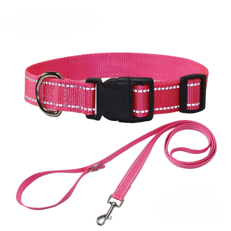 Pink dog collar with matching leash, black buckle, metal D-ring
