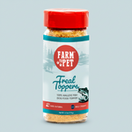 Fish treat topper in clear glass jar with red cap, crumbly golden topping inside.
