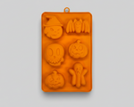 Orange silicone pet treat mold with multiple Halloween animal and pumpkin shapes.