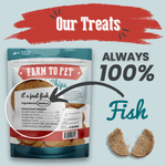 Fish chips dog treat pouch with back label plus two loose fish-shaped treat pieces