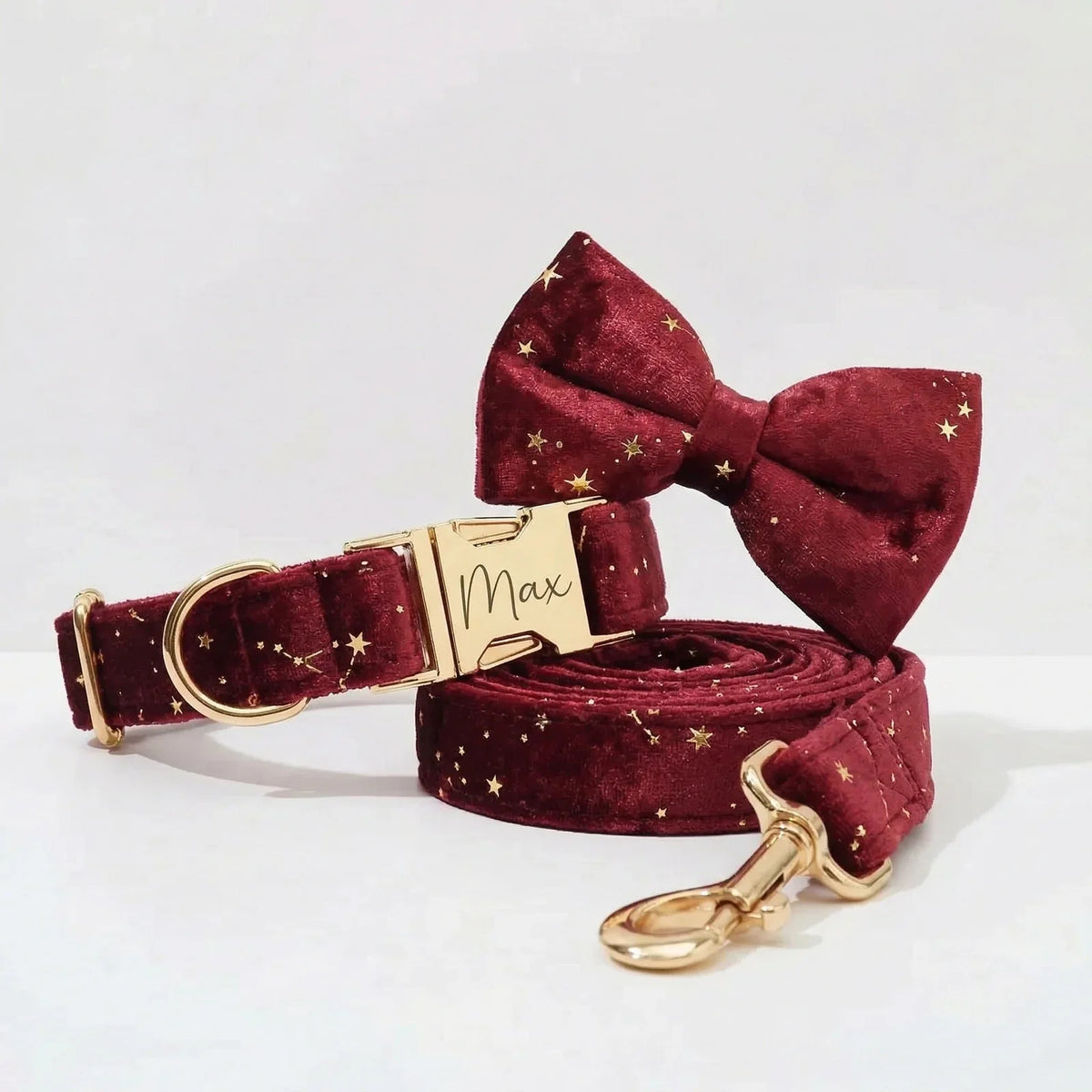 Burgundy velvet star bowtie collar set with matching leash and gold metal hardware