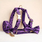 Violet bat-print dog harness with leash and gold buckles