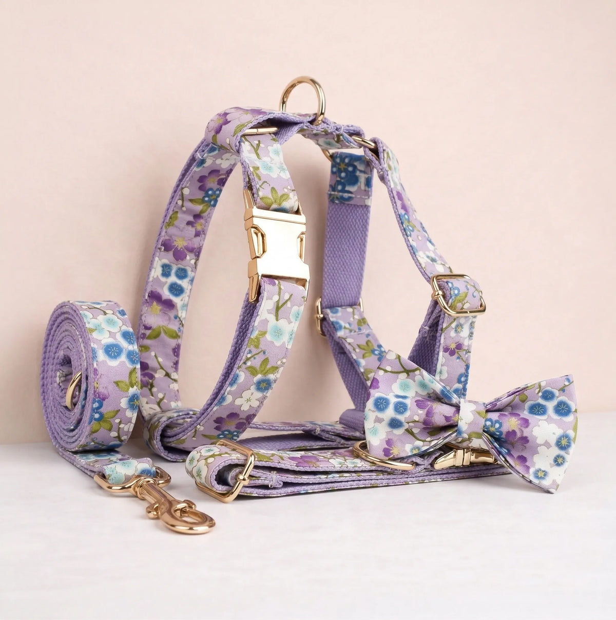 Lilac floral dog harness set with leash and bow tie, gold hardware and patterned straps