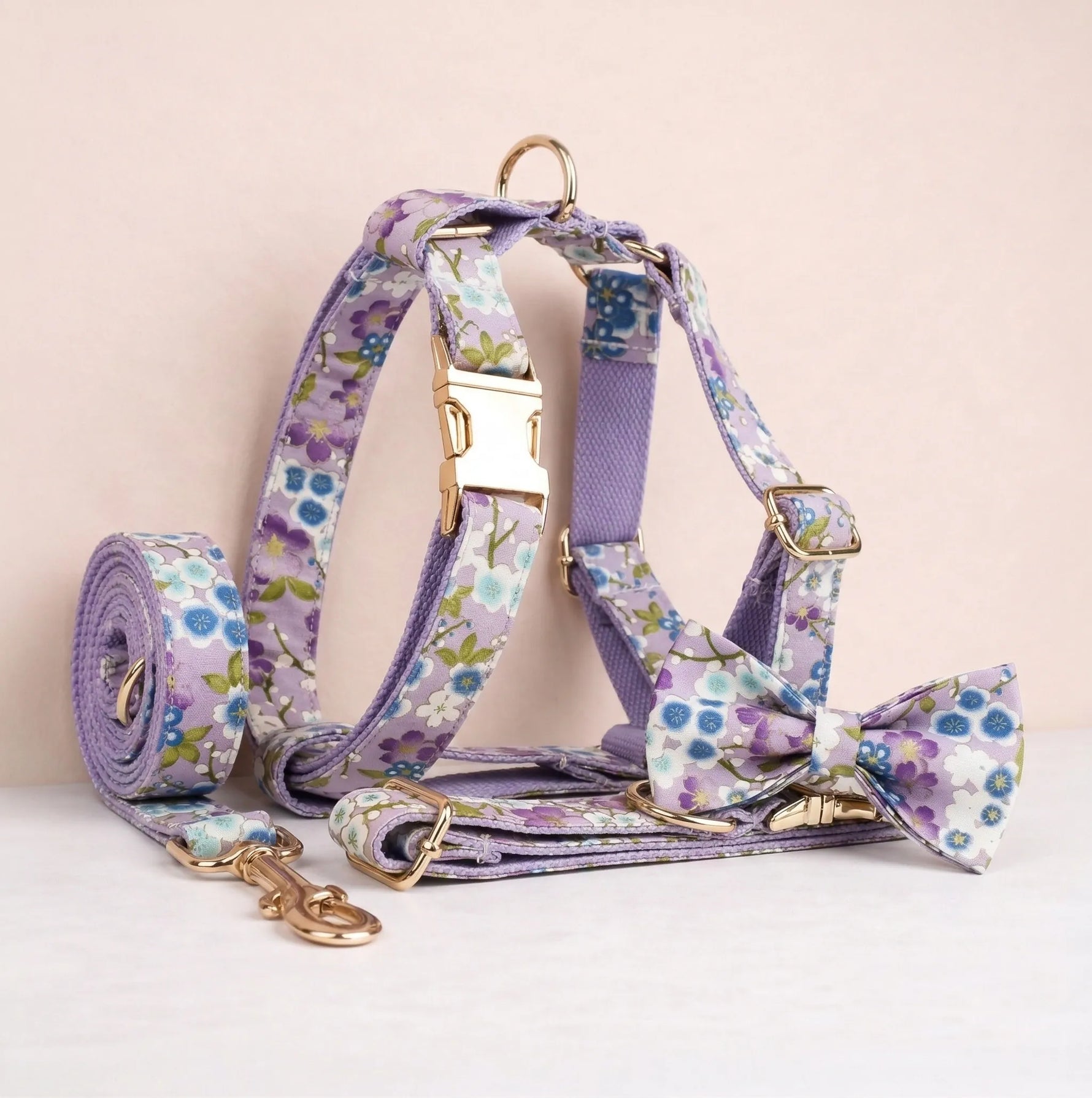 Lilac floral dog harness set with leash and bow tie, gold hardware and patterned straps