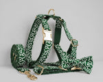 Emerald swirl dog harness with gold hardware, patterned straps and front ring