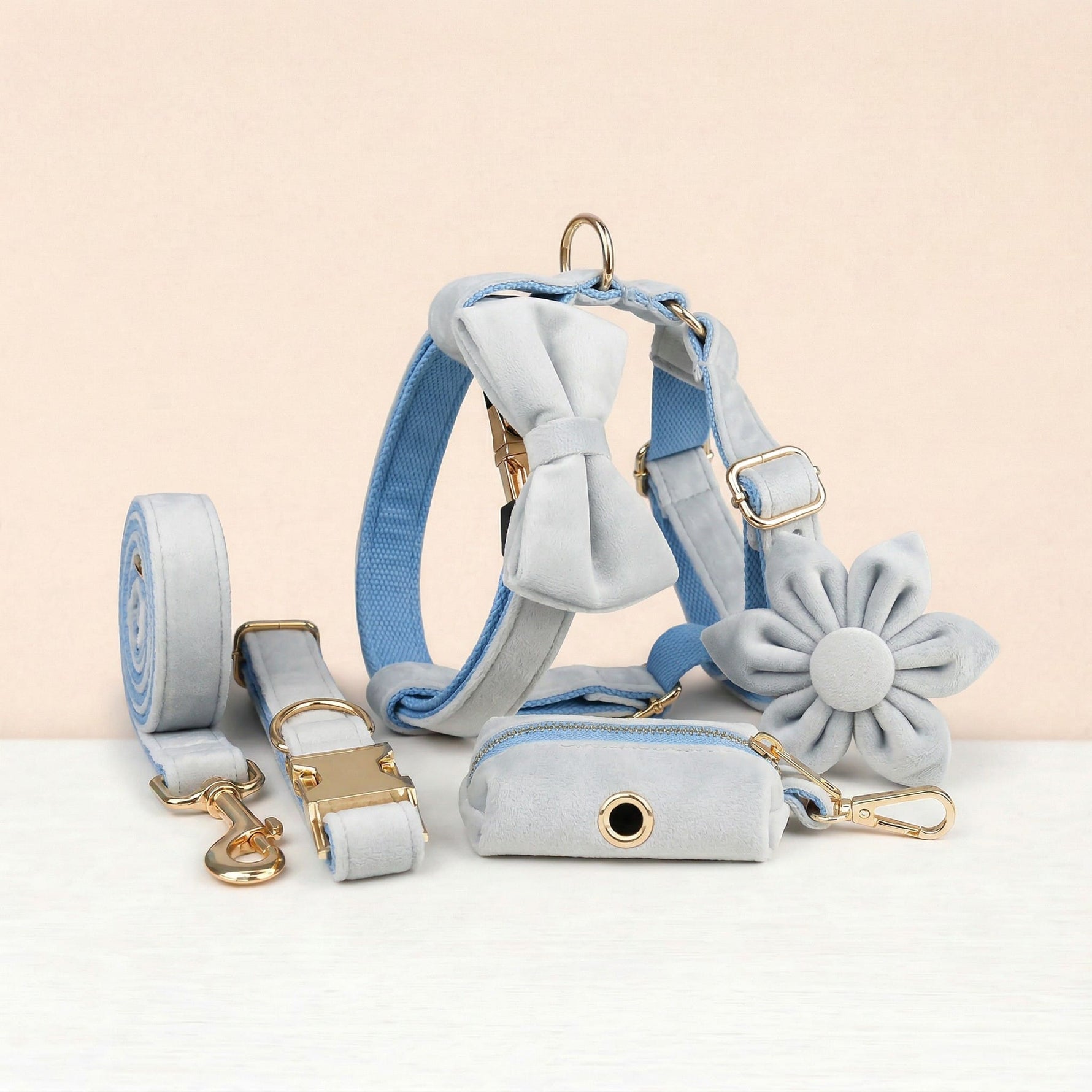 Light blue velvet dog collar set with harness, leash, bowtie, flower and poop bag holder