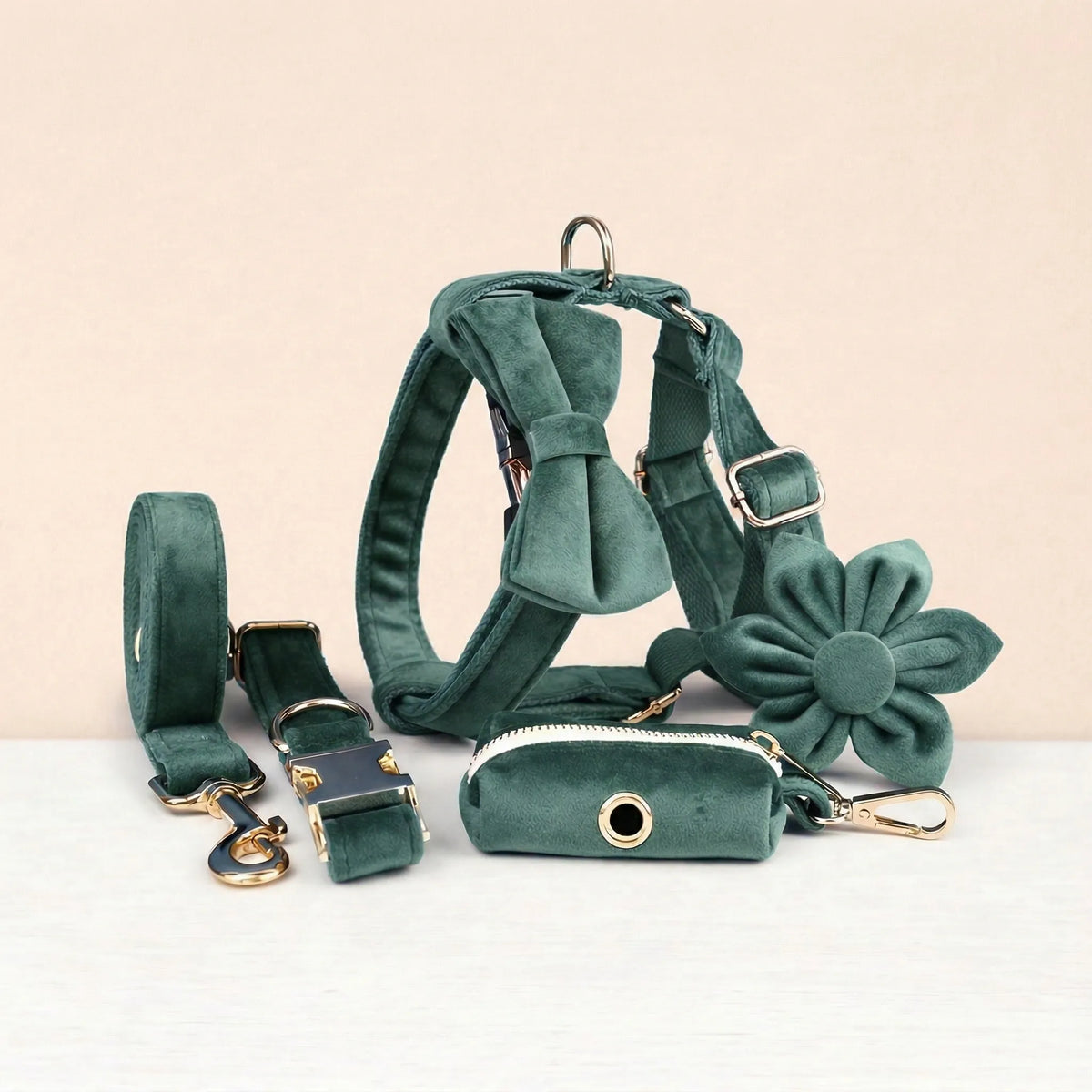Teal velvet dog harness set with collar, leash, flower bowtie, and poop bag holder