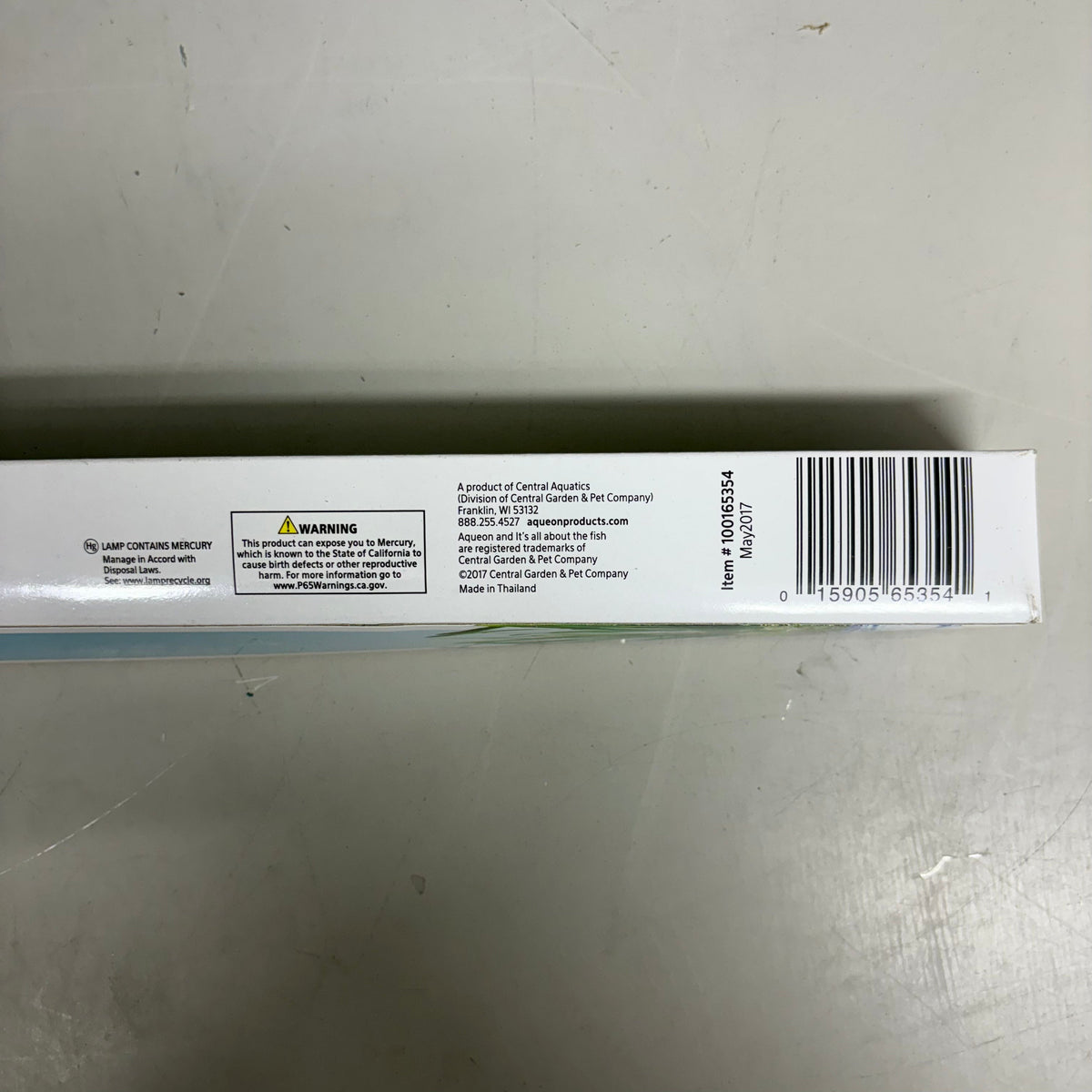 Aqueon T8 aquarium lamp box side with barcode and warning labels