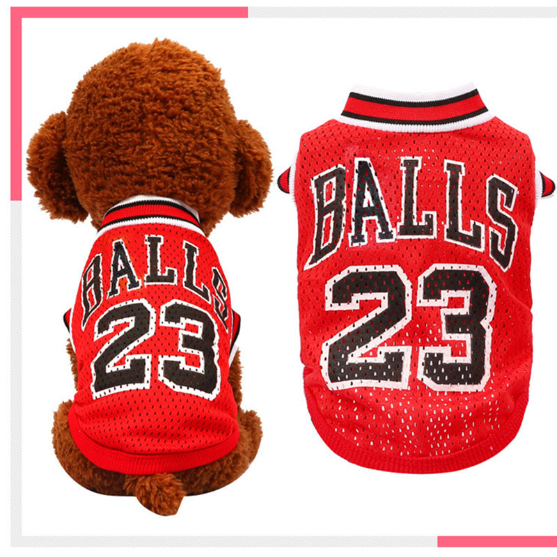 Pair of red and red/or dark basketball pet jerseys with “BALLS 23” number and striped collar
