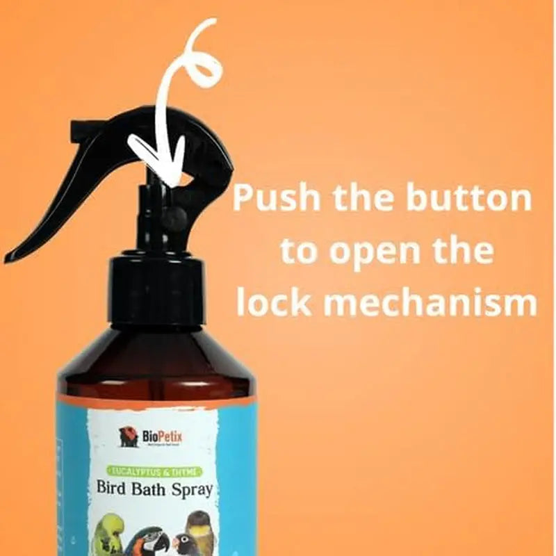 Bird bath spray bottle with pump and open-lock mechanism instruction arrow