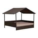 Raised pet cabana bed with dark brown rattan weave frame and beige cushion