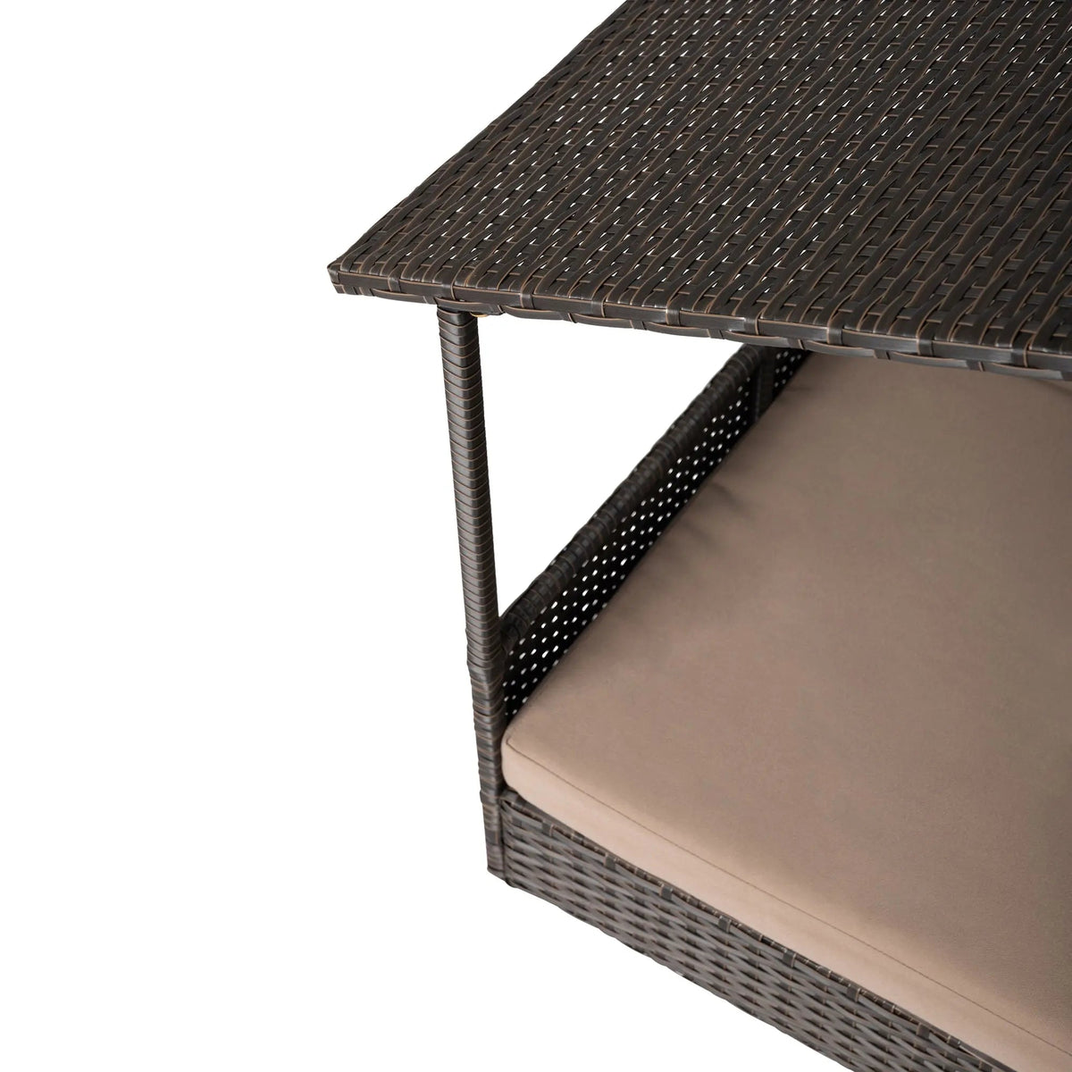 Raised pet bed with dark brown wicker frame and beige cushion, side view