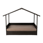 Raised pet bed with woven dark brown frame, beige cushion, open-front house design