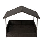 Woven dark brown wicker pet bed with slanted roof panels and beige cushion base