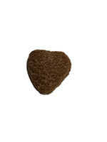 Heart-shaped dog treat, dark brown, textured surface