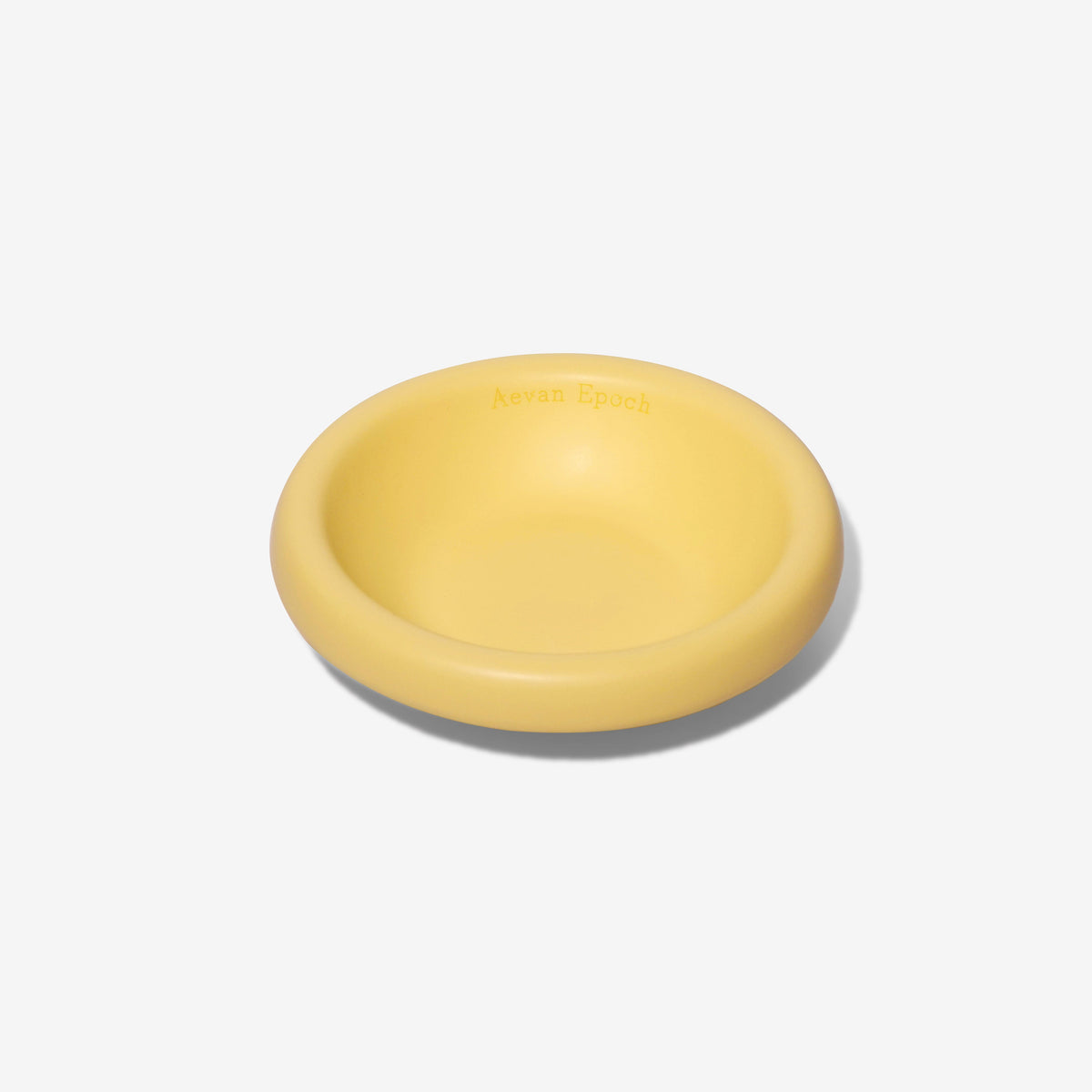 Yellow stoneware pet bowl, shallow round dish with glossy finish