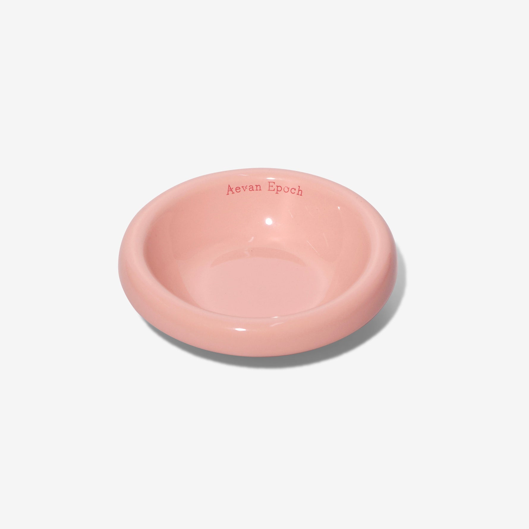 Stoneware pet bowl, glossy blush pink, shallow round dish with raised rim