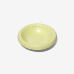 Stoneware pet bowl, glossy pale yellow-green, shallow round dish with raised rim