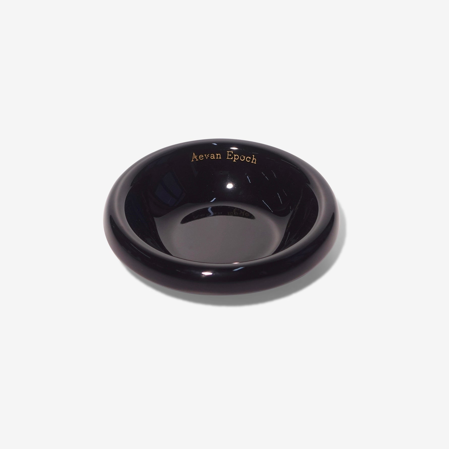Stoneware pet bowl, glossy black, shallow round dish with raised rim