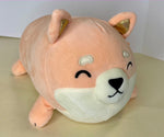 Large peach squishy plush pet toy with white muzzle, cloud patch, and sleepy smile